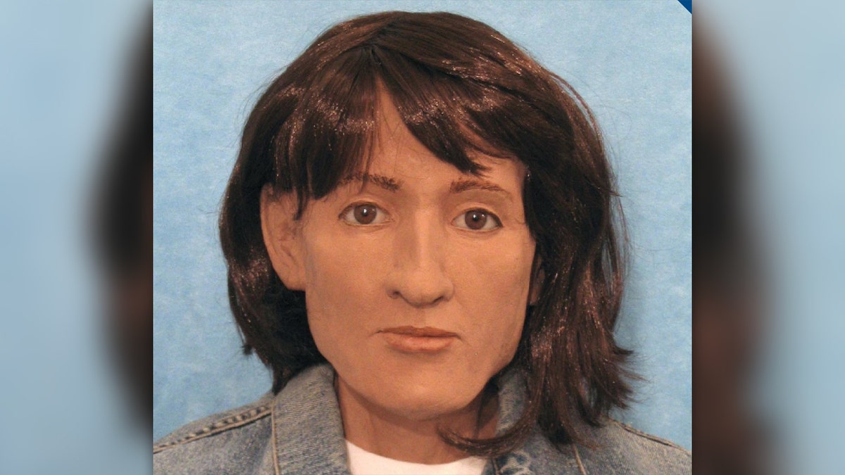 Reconstruction of woman with shoulder length brown hair, brown eyes, wearing a denim jacket