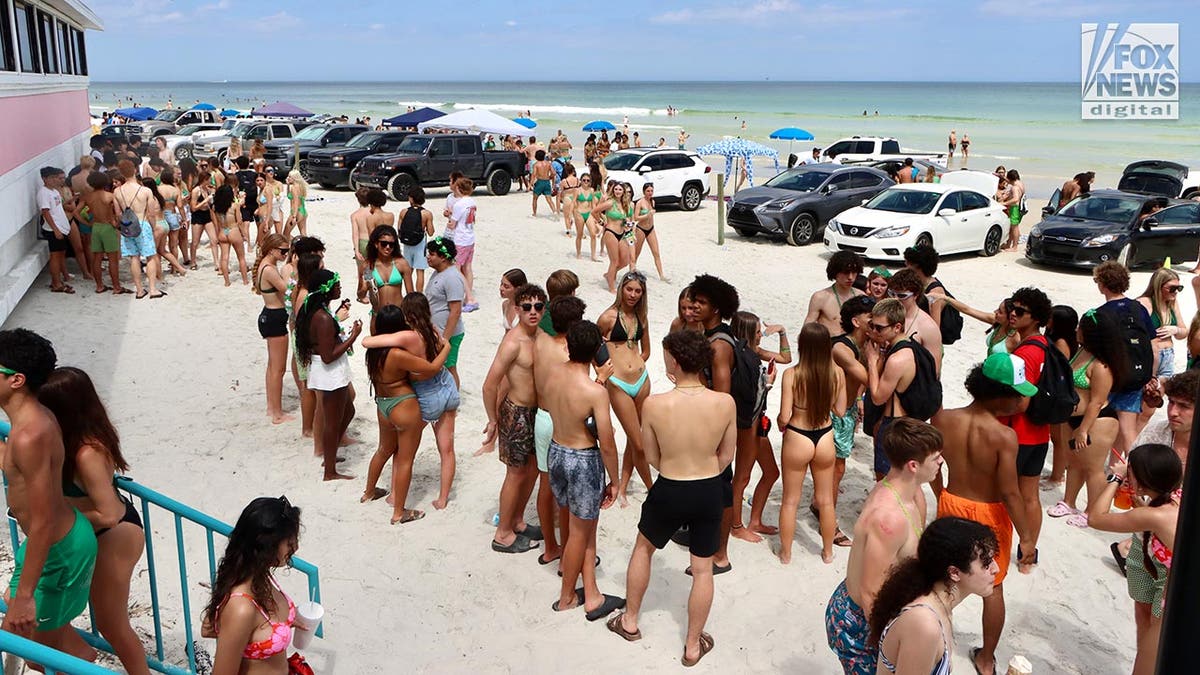 Spring breakers enjoy the beach in Florida