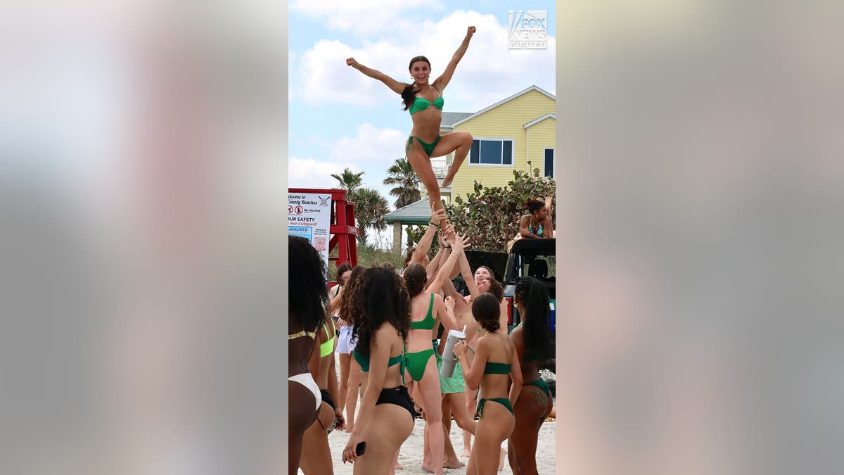 Spring breakers enjoy the beach in Florida