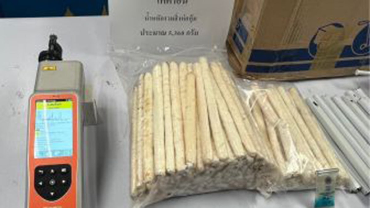 Cocaine seized by officials shown on evidence table