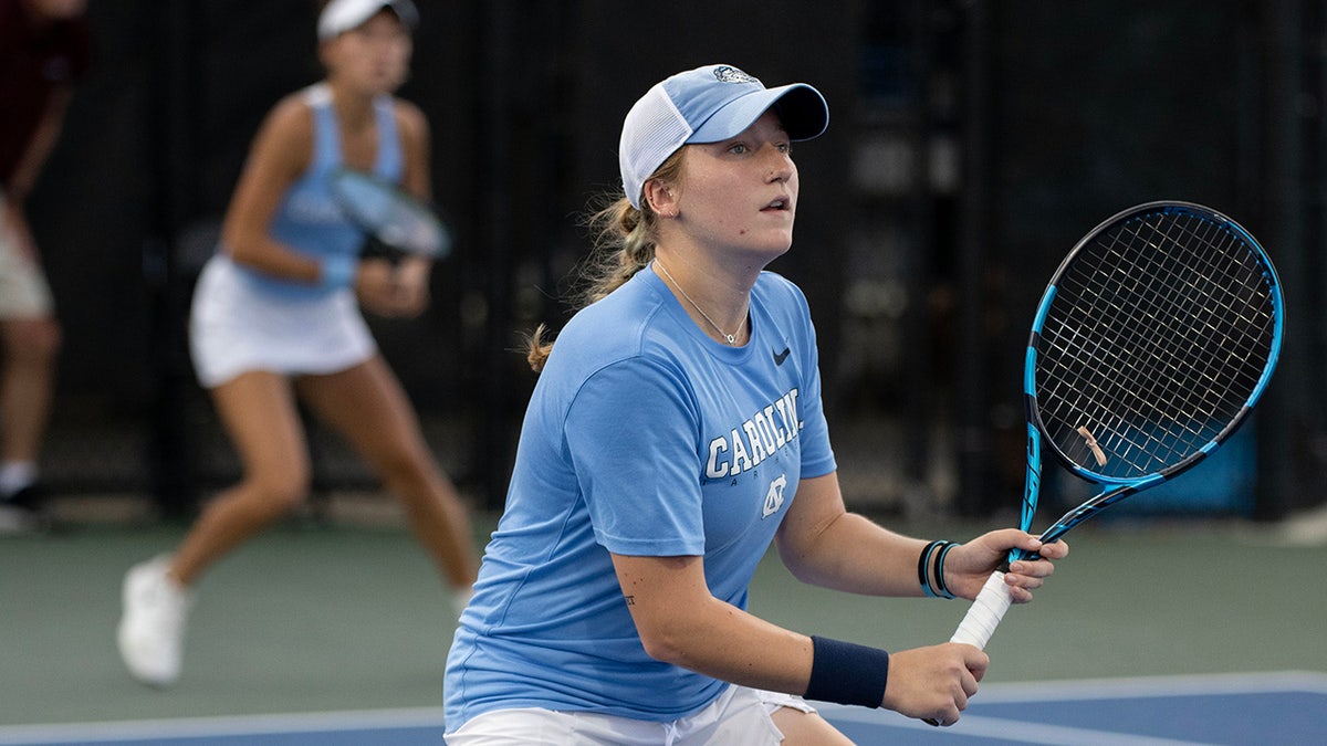 Reese Brantmeier plays in a tennis tournament