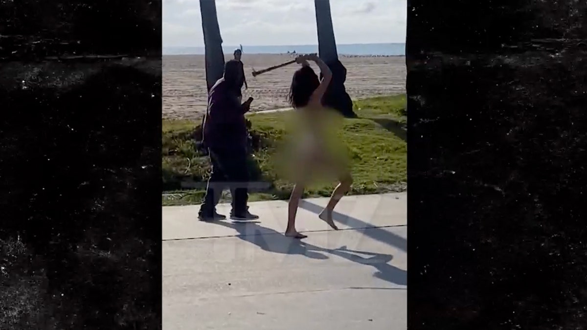 Venice Beach brawl naked woman swings spiked club