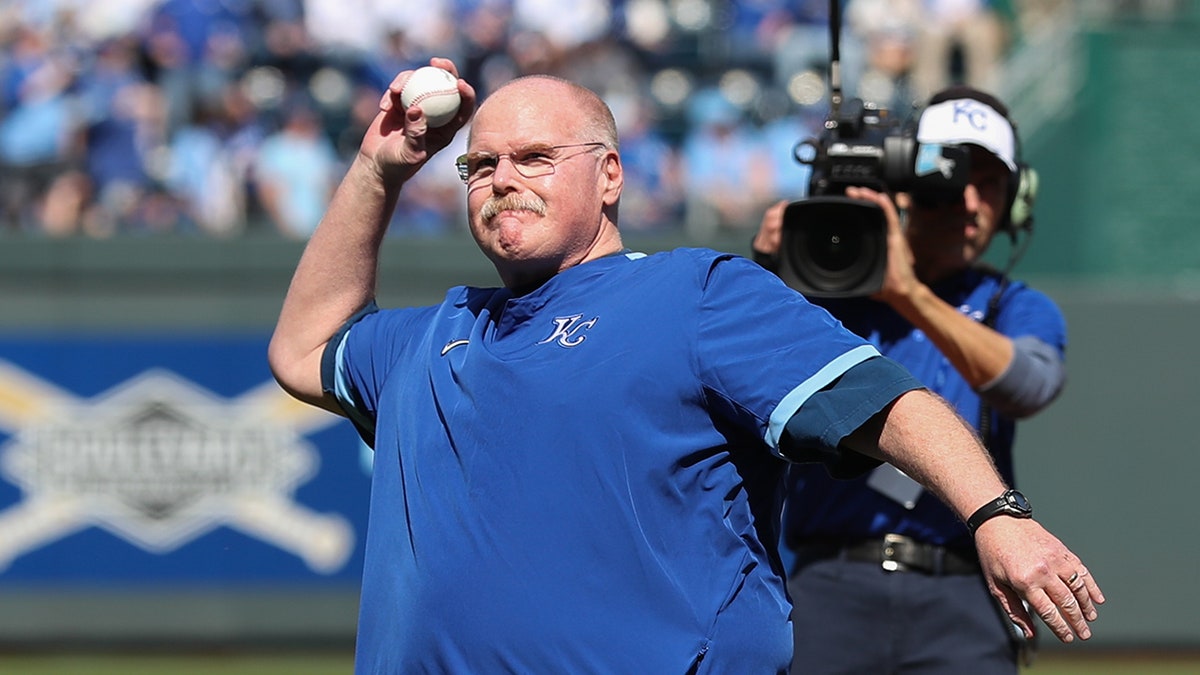 Andy Reid throws a pitch
