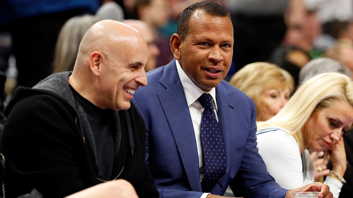 Alex Rodriguez and Marc Lore courtside
