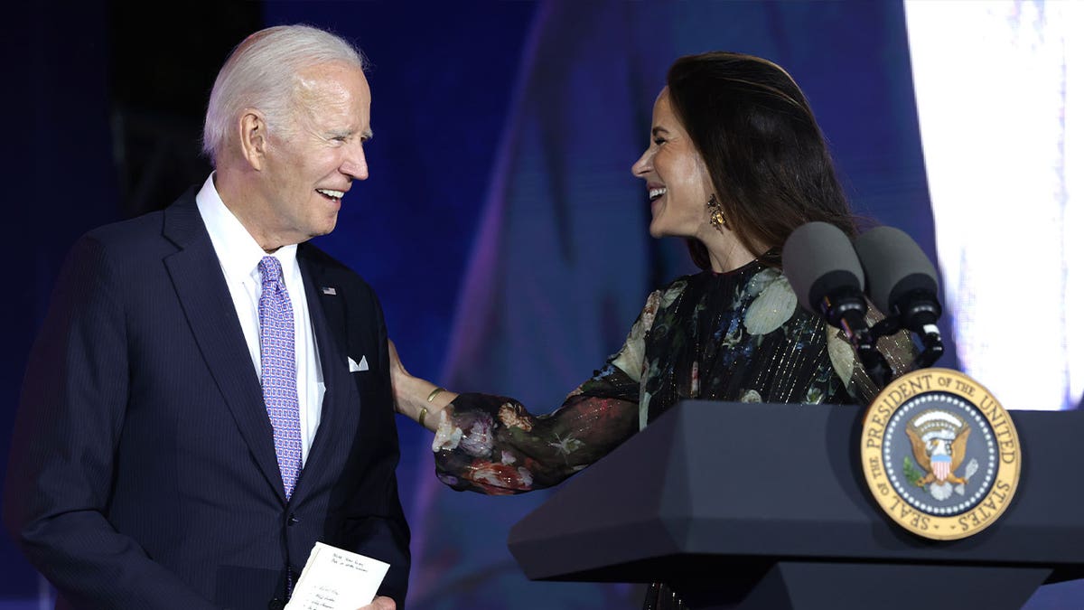 ashley biden smiles with joe biden