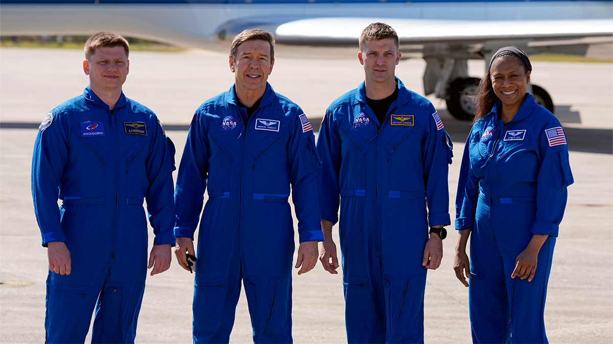 Astronauts pose for a picture