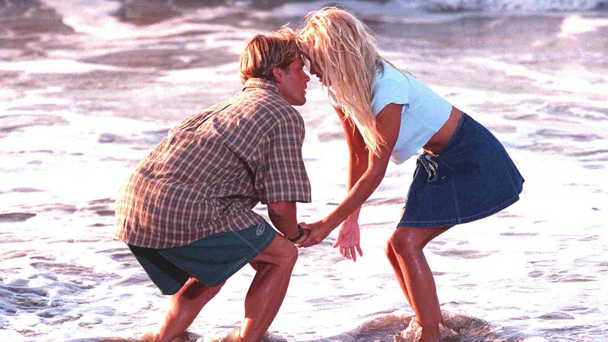 Baywatch stars Pamela Anderson and David Chokachi at the beach