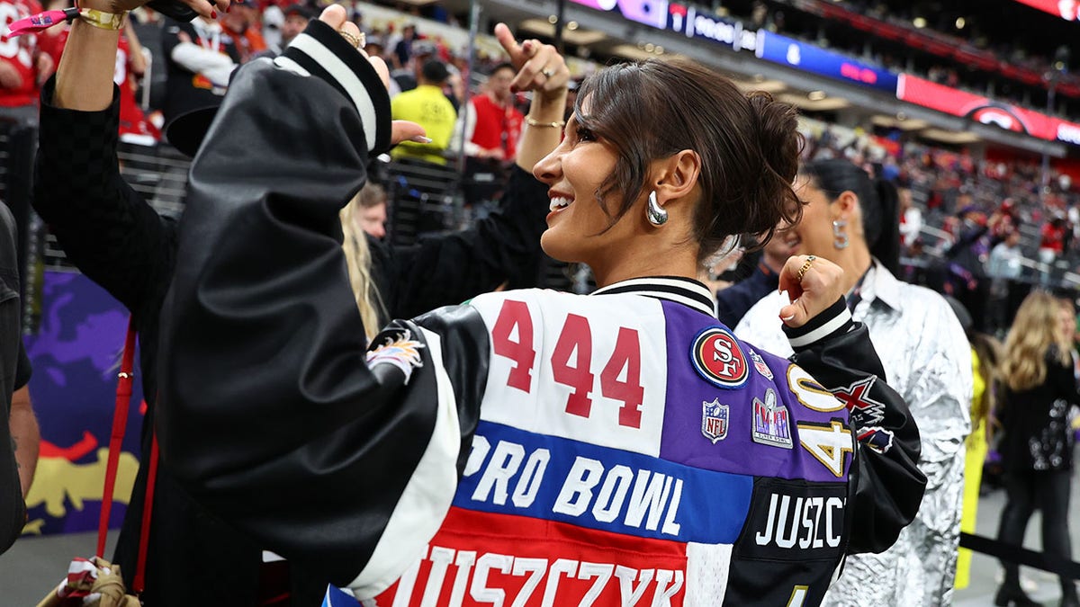 Kristin Juszczyk with her big jacket