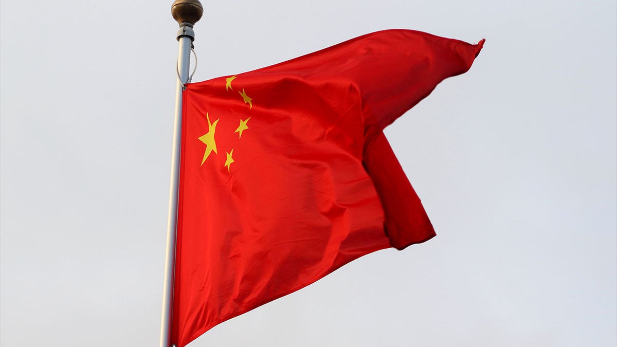 Chinese mobsters are the latest concern for states like Oklahoma that are dealing with the fallout from the open border. | FILE: The national flag of the People's Republic of China waves in the wind on Nov. 2, 2023.