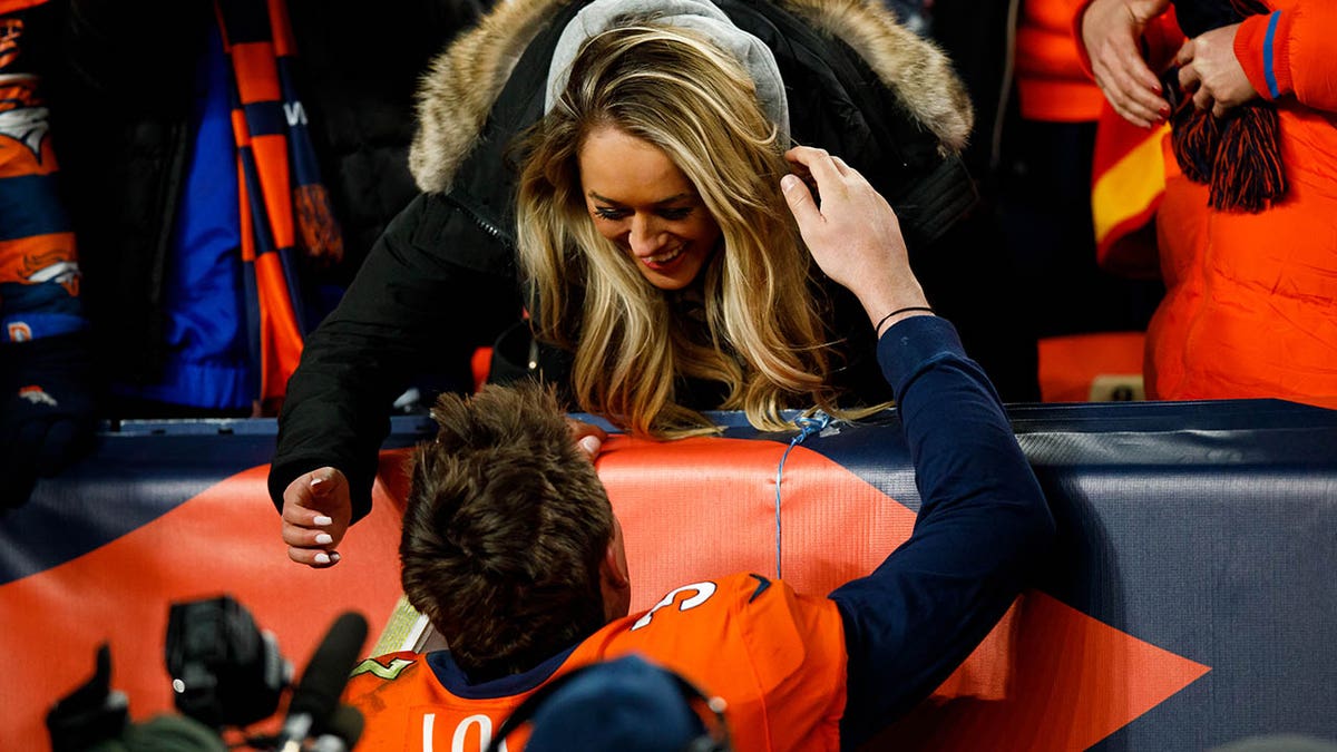 Drew Lock with wife