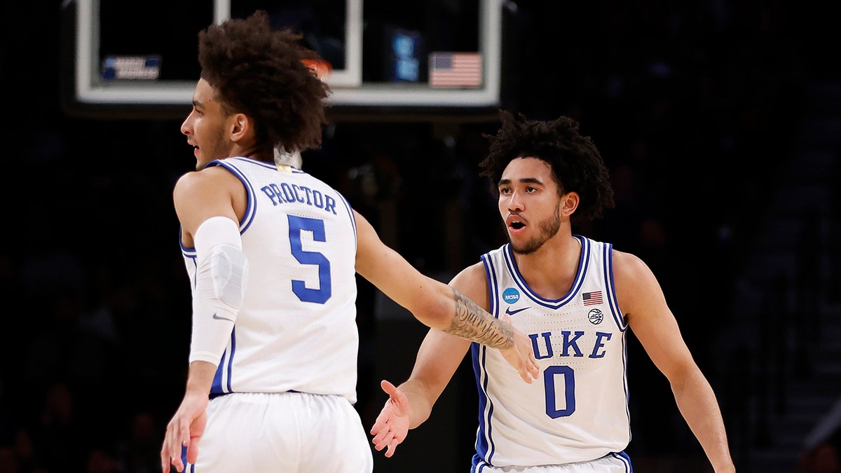 Duke players high fiving