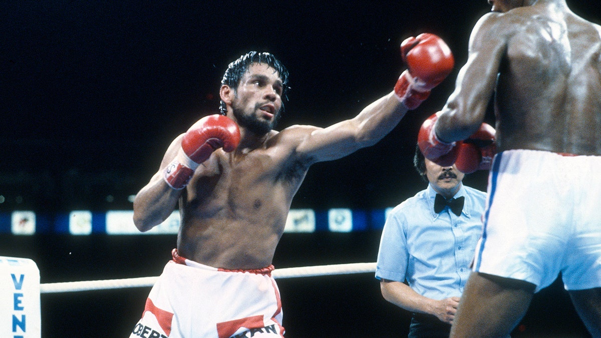 Roberto Duran lands a punch