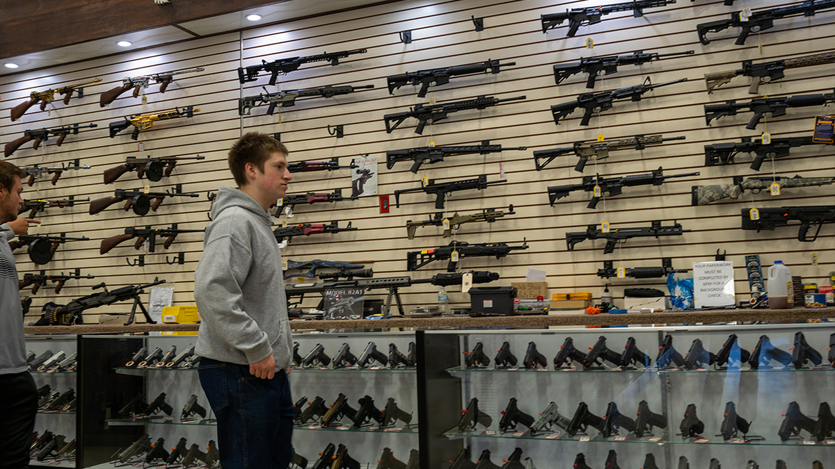 Young man at gun store in Pennsylvania