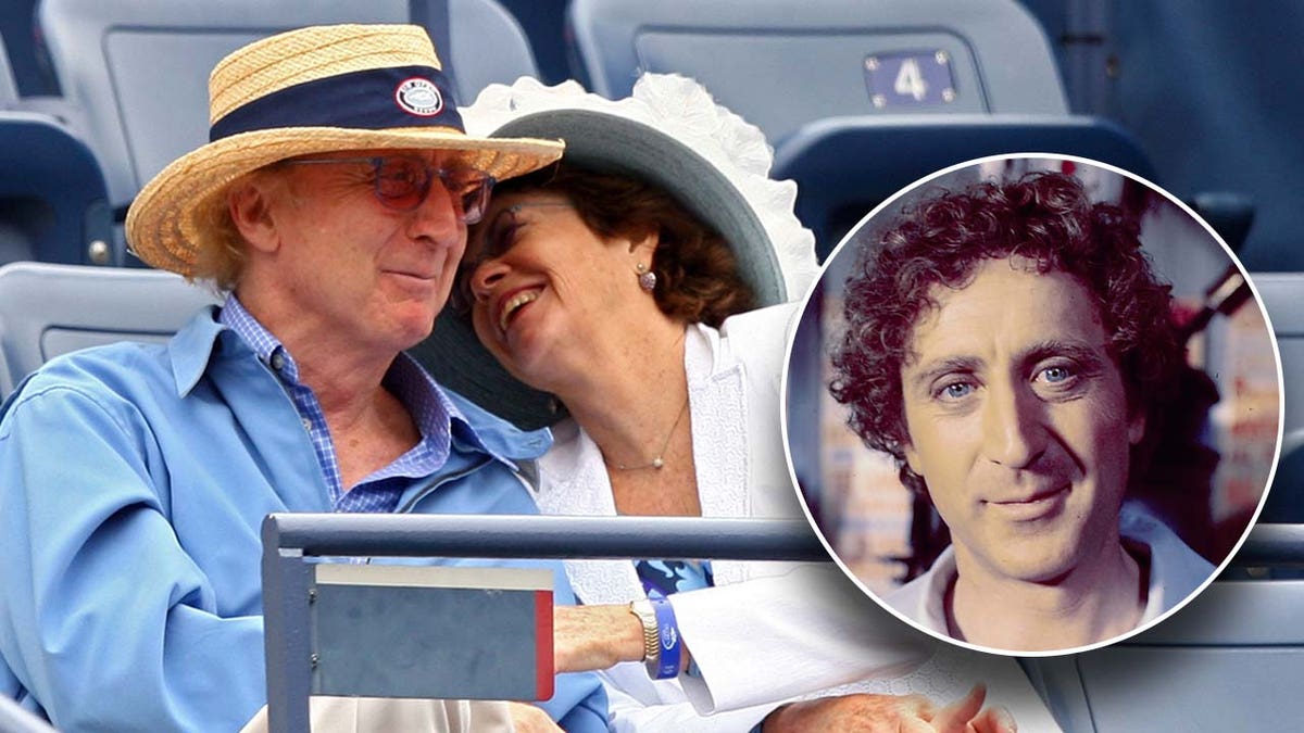 Actor Gene Wilder wears hat and blue shirt at tennis game with wife Karen Boyer