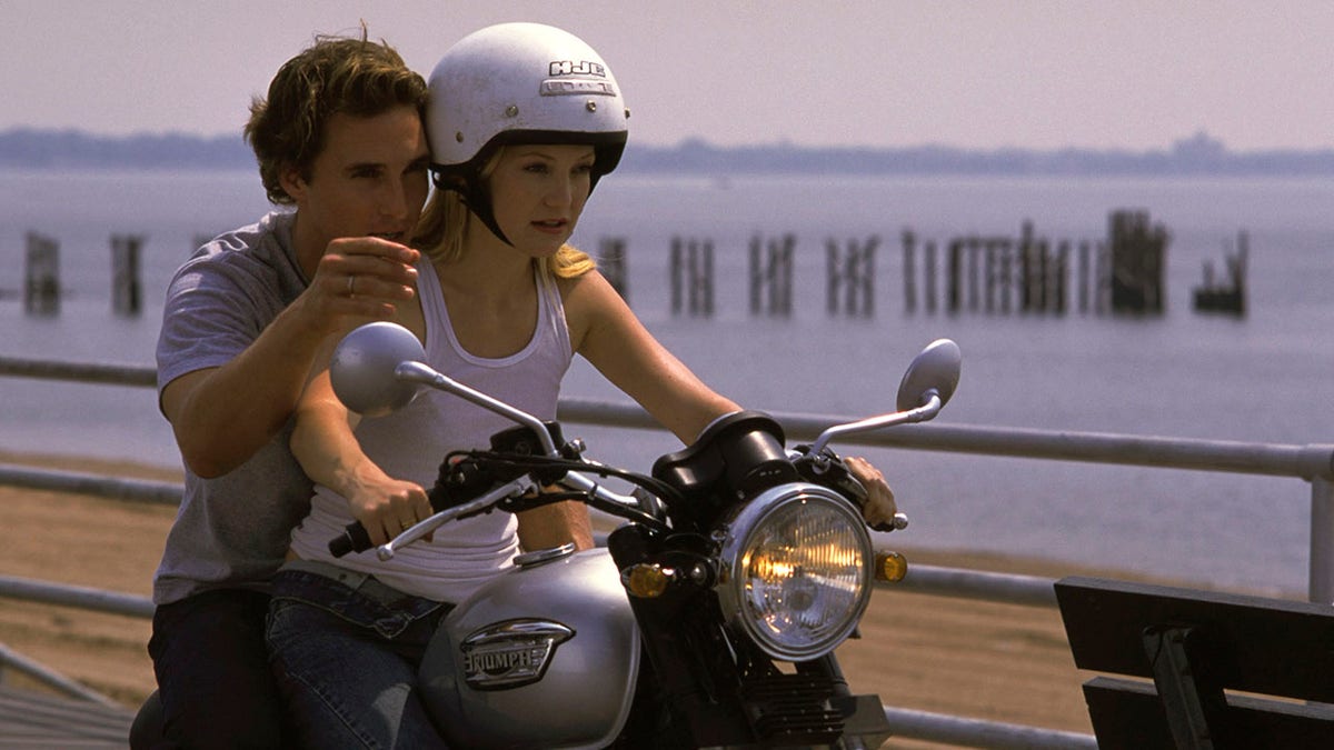 Matthew McConaughey as Ben directs Kate Hudson as Andie in "How to Lose a Guy in 10 Days" on the back of a motorcycle