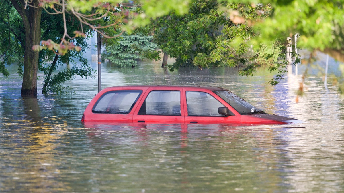 Car submerged successful water