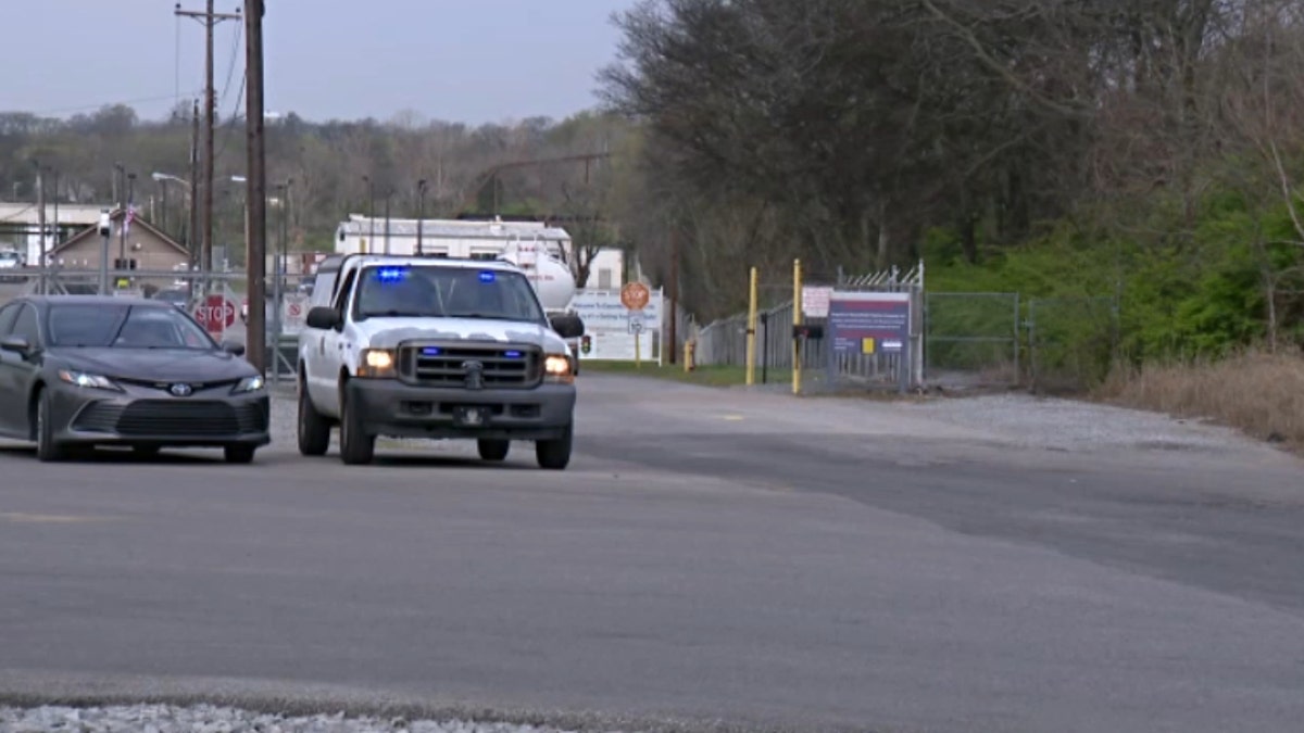 Police vehicles gather near the scene of a press conference where MNPD Chief Drake announced the discovery of Riley Strain's body 