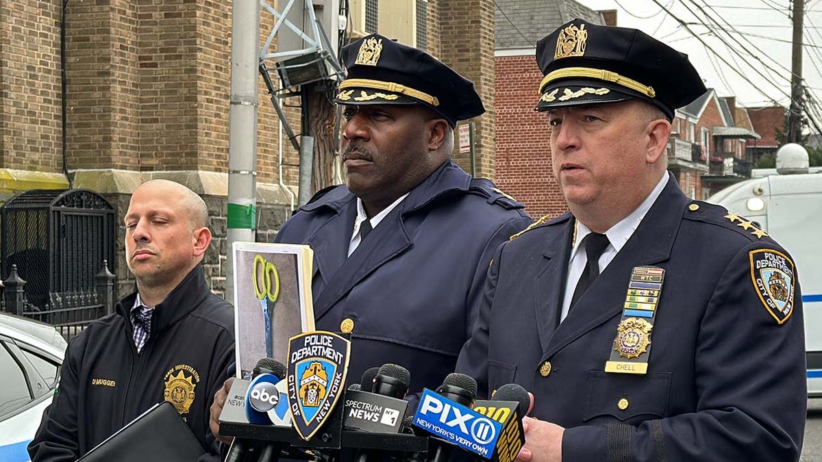 Police officers giving information about the fatal shooting