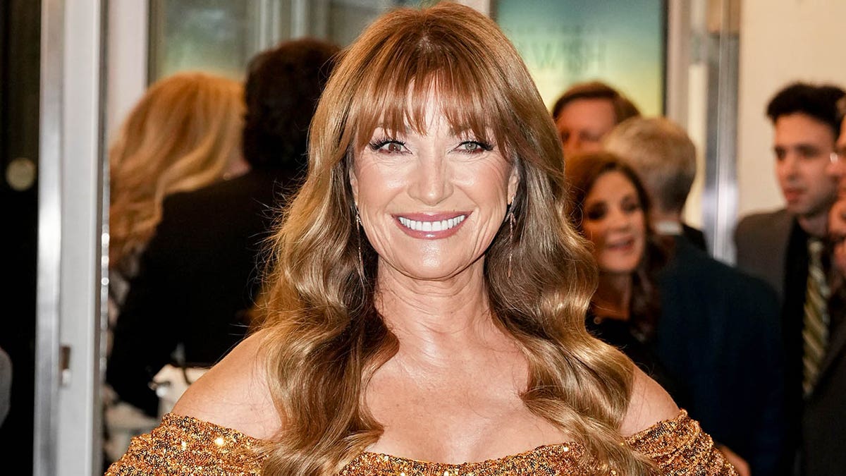 jane seymour smiling in gold gown