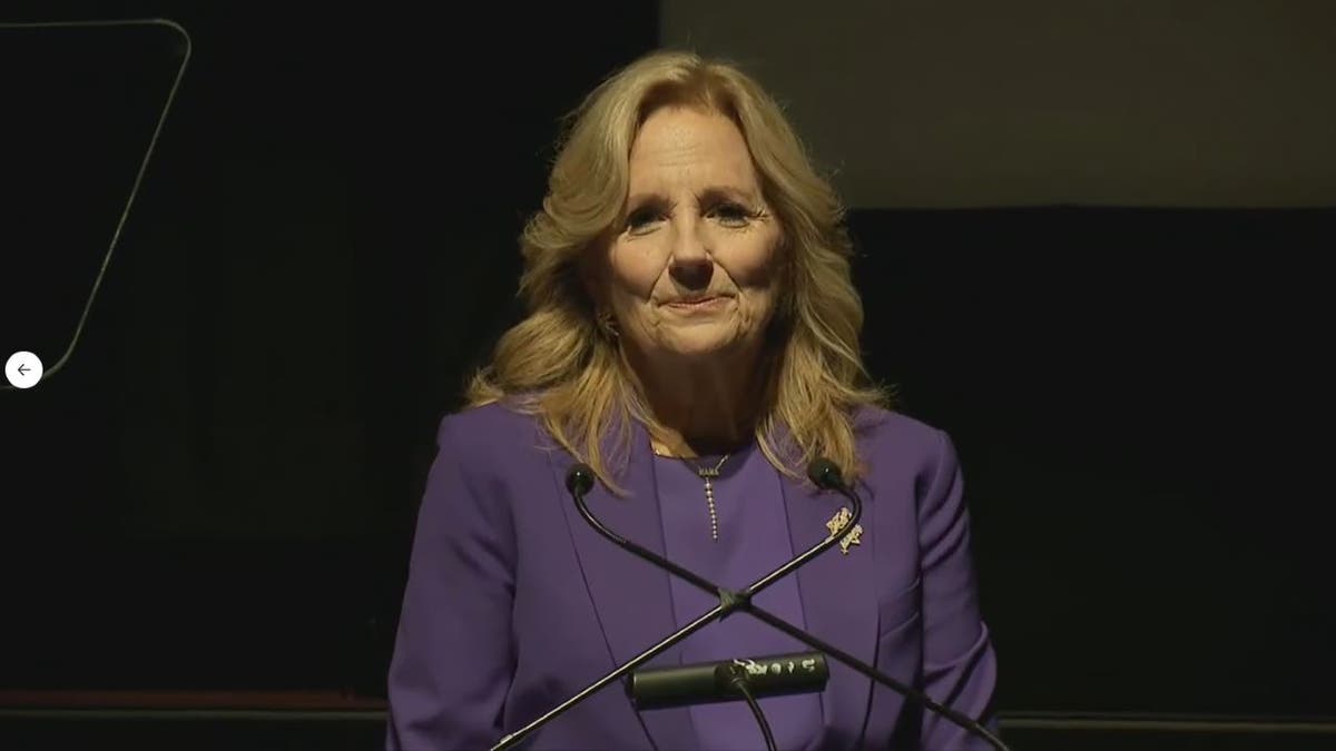 Jill Biden standing at podium