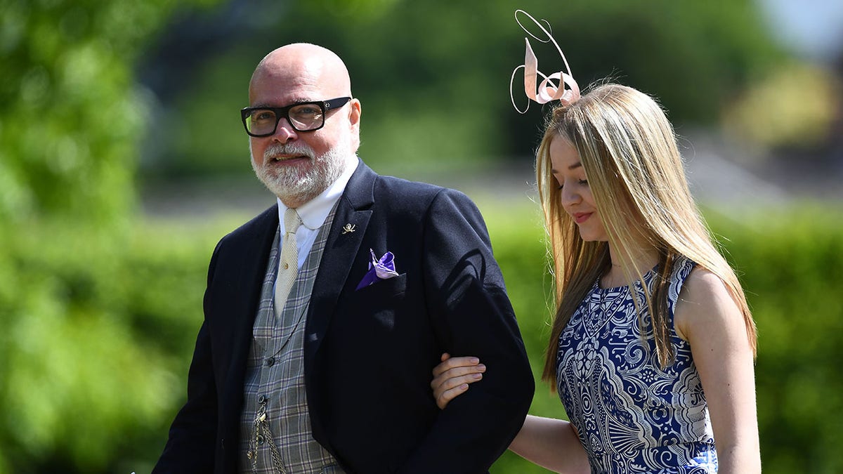 Gary Goldsmith in a dark blazer and plaid vest arrives at Pippa Middleton's wedding