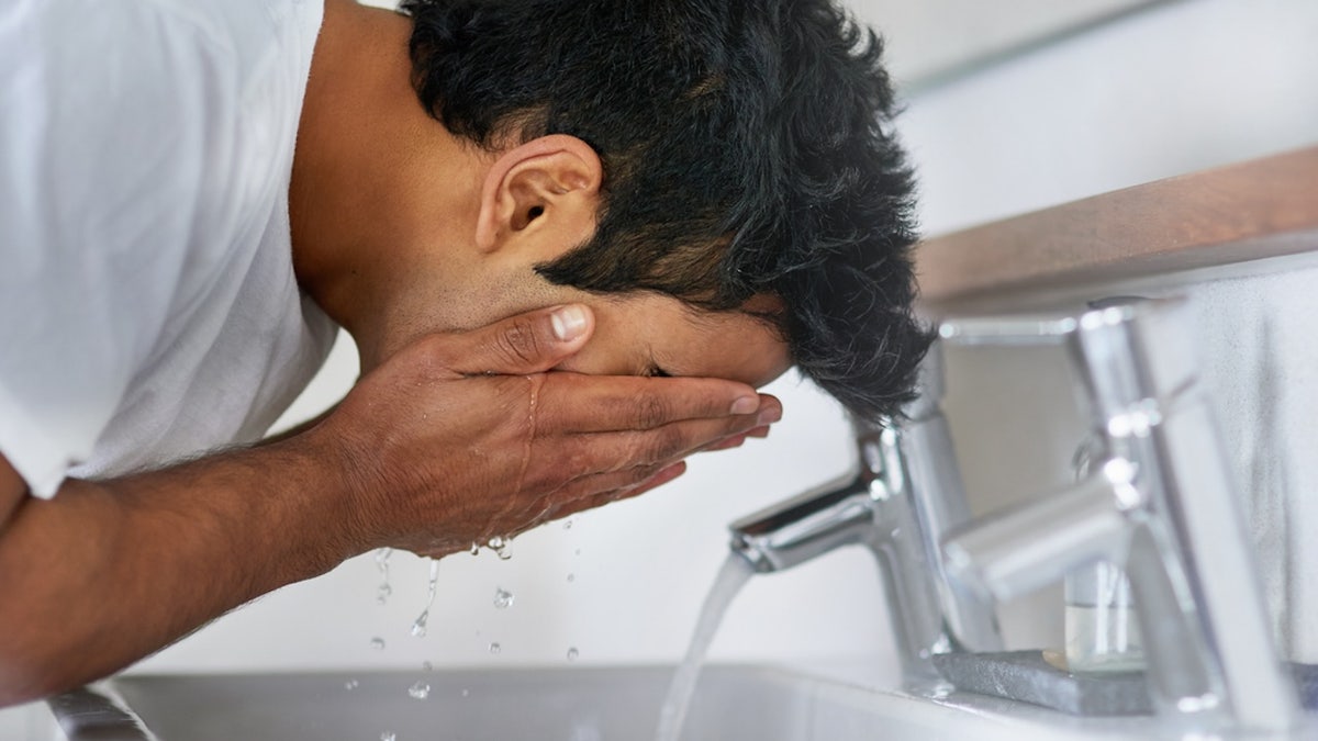 Man washing face