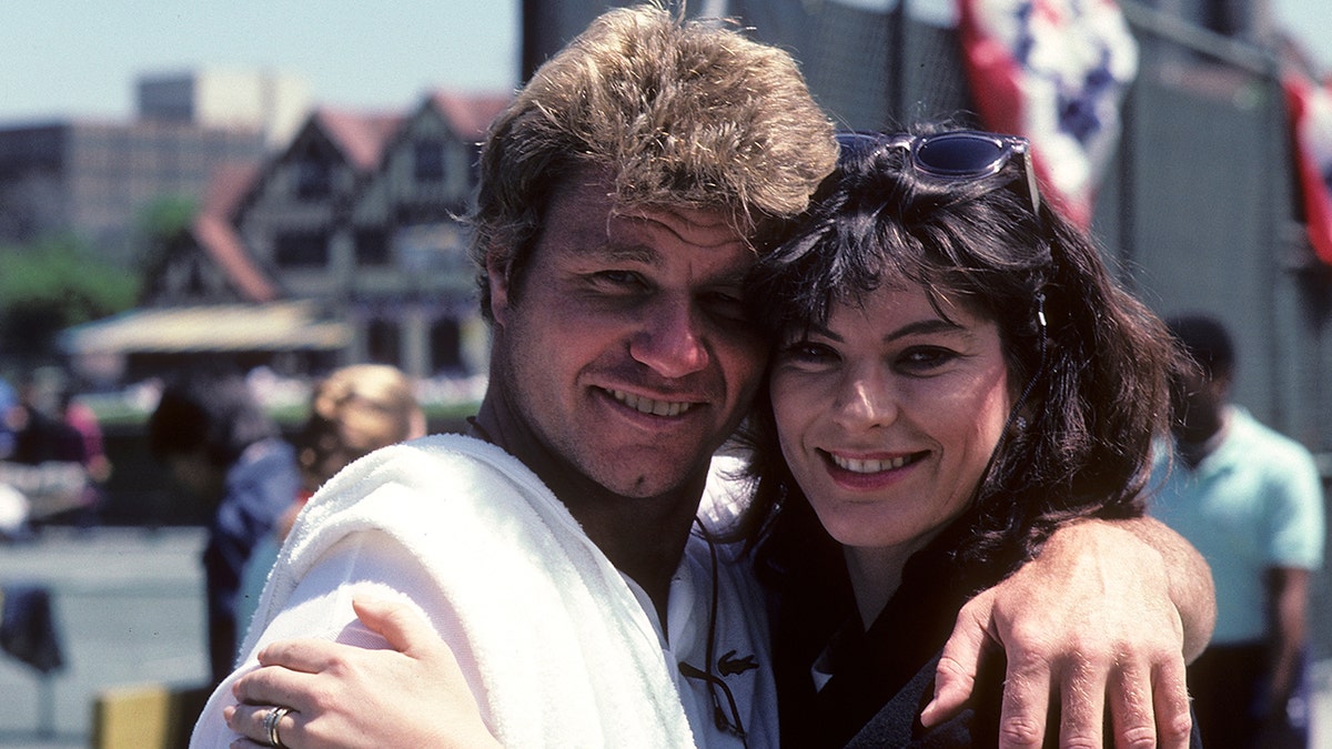 Martin Kove and his wife Vivienne Kove hugging