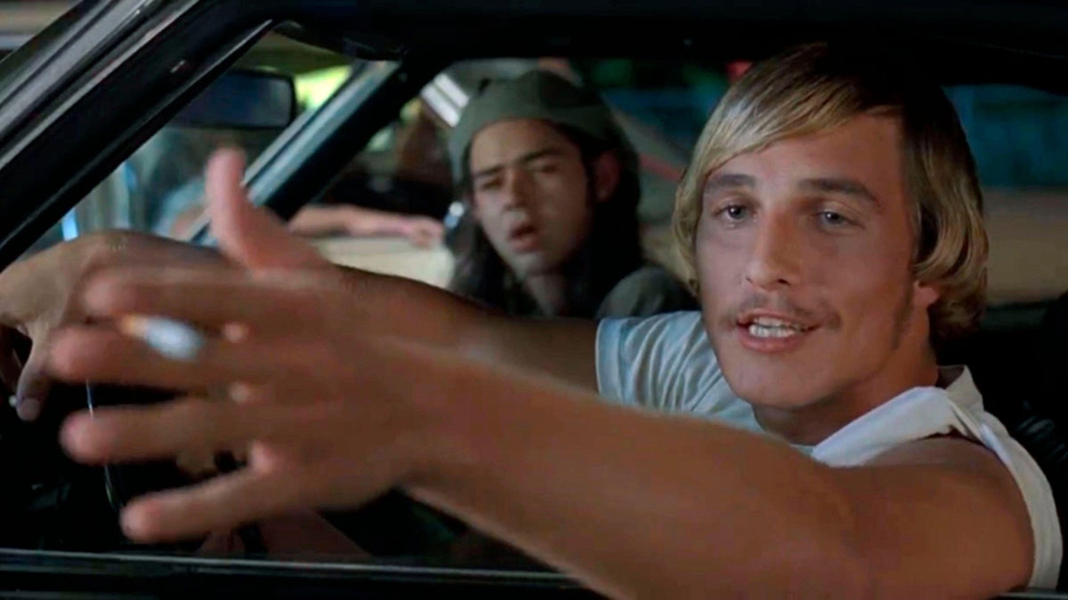 Matthew McConaughey in the car during "Dazed and Confused" as David Wooderson