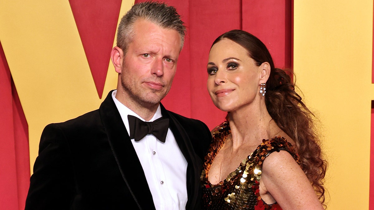 Minnie Driver and her boyfriend at the Vanity Fair Oscar Party