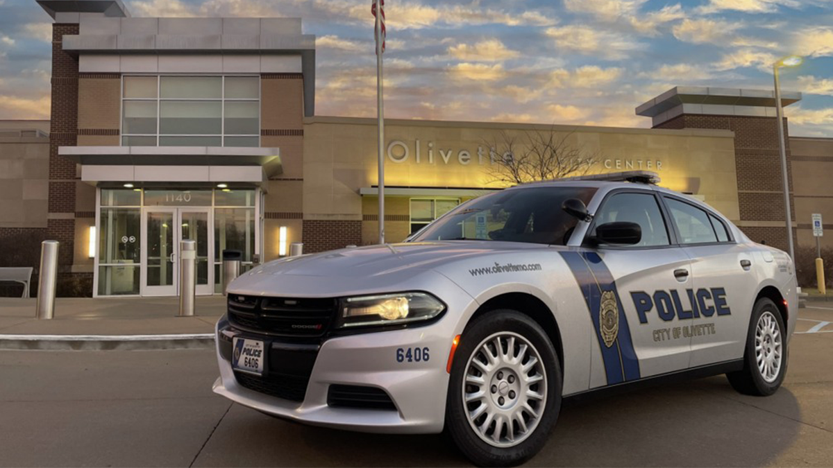 Olivette police car outside department building