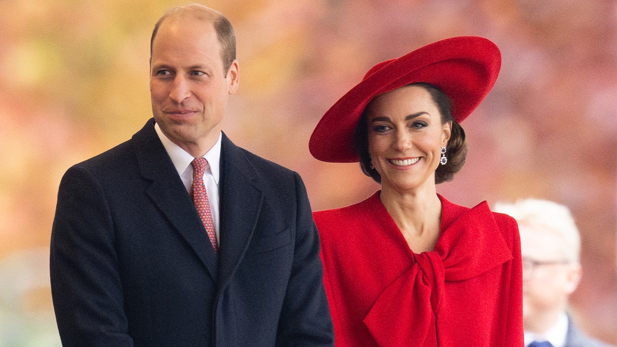 Príncipe William e Kate Middleton sorrindo