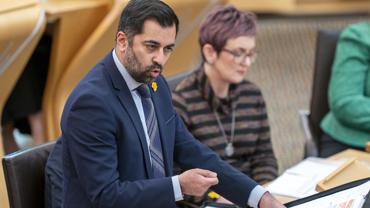 Scottish politician Humza Yousaf speaks in parliament