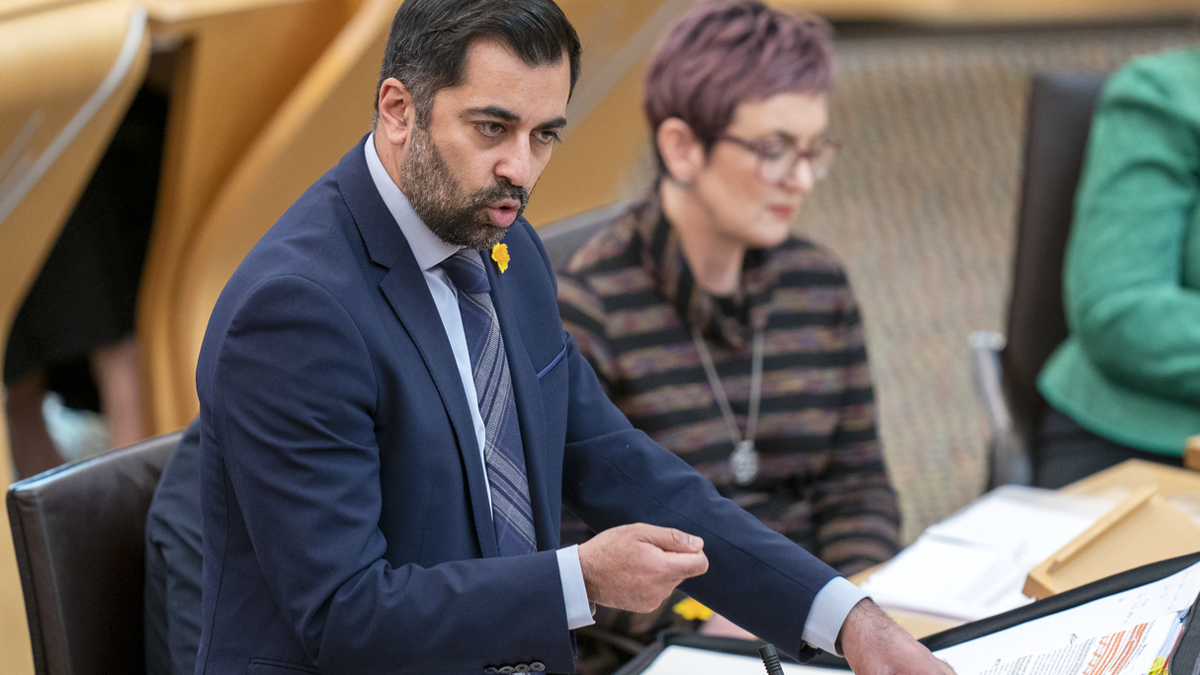 Scottish politician Humza Yousaf speaks in parliament