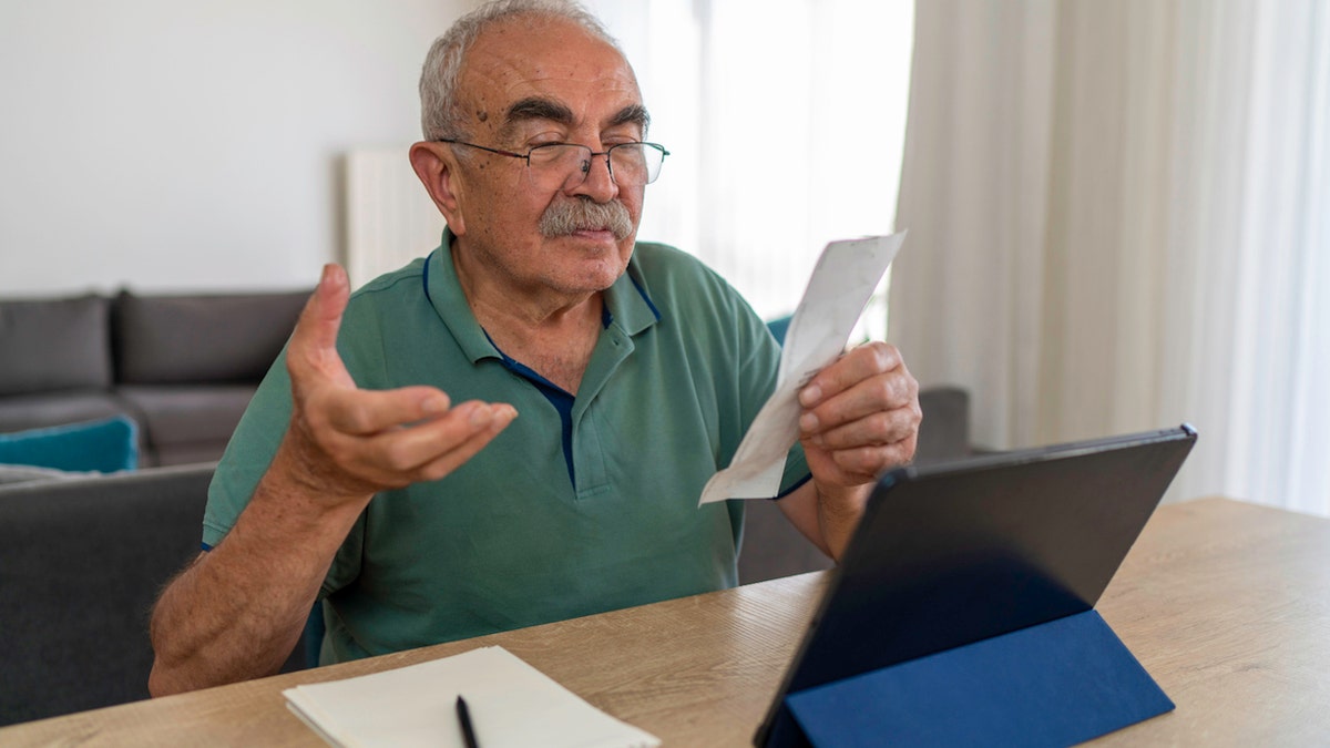 Man with medical bill