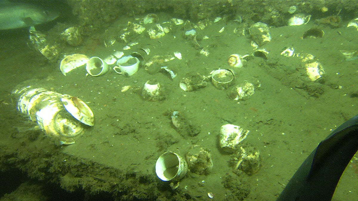 Plates and cups from the 1989 steamship Portland's wreckage. 