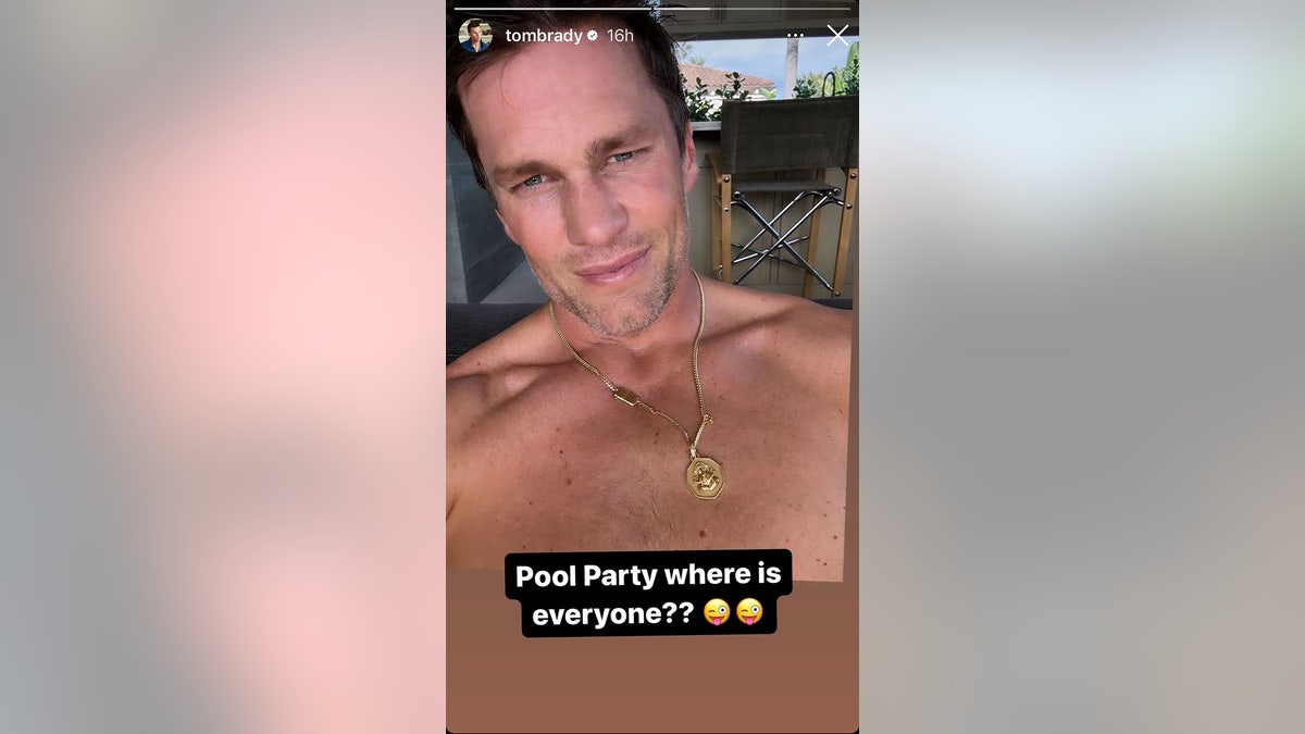 A shirtless Tom Brady selfie