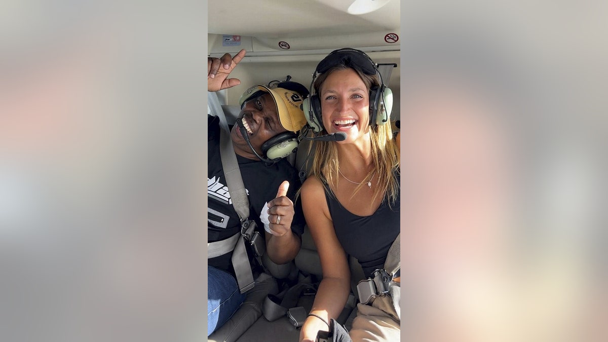 Kasa and Goldstein on the helicopter ride