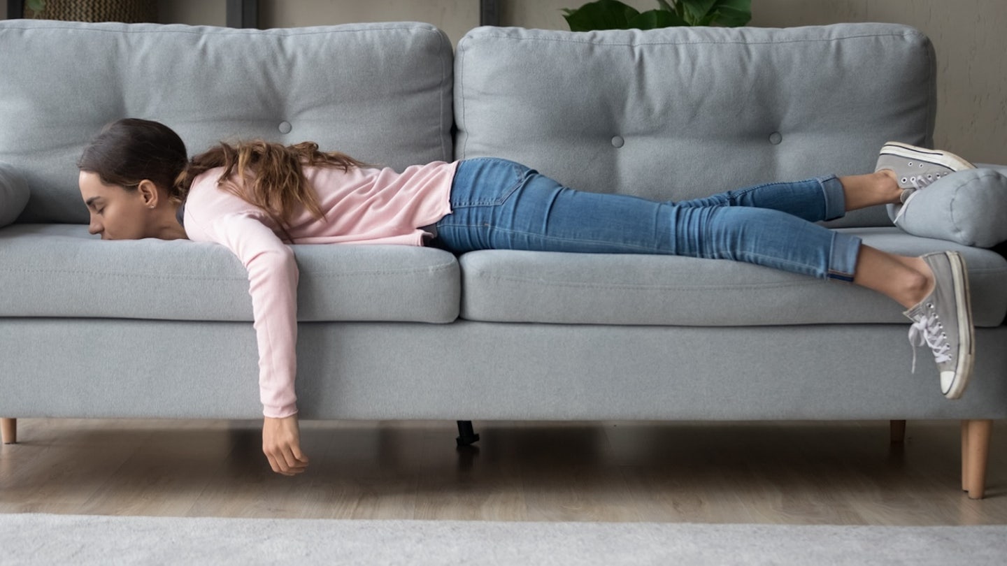 woman tired couch