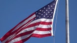 american flag is seen waving in wind