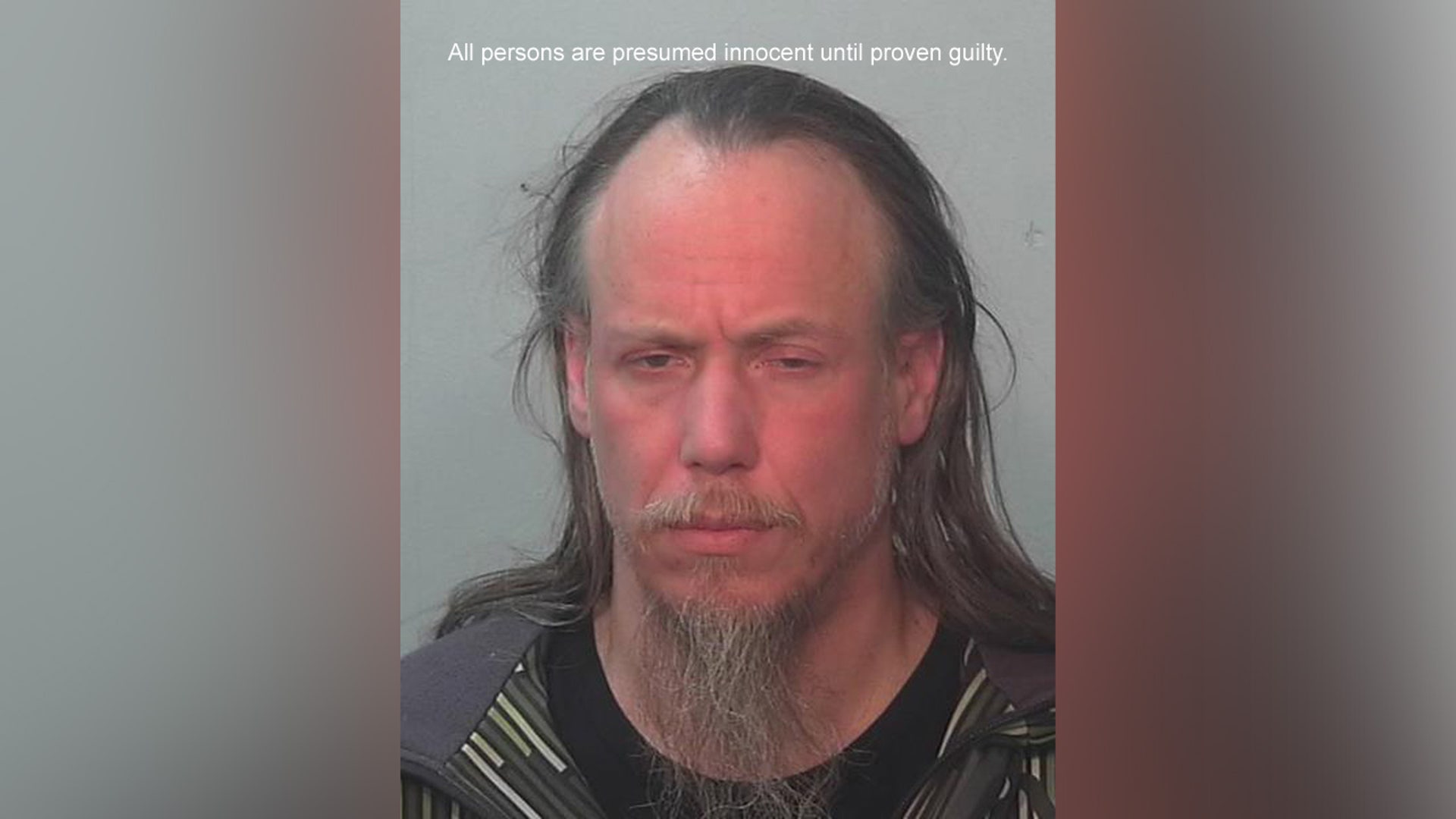 A mugshot of Mark Melchi