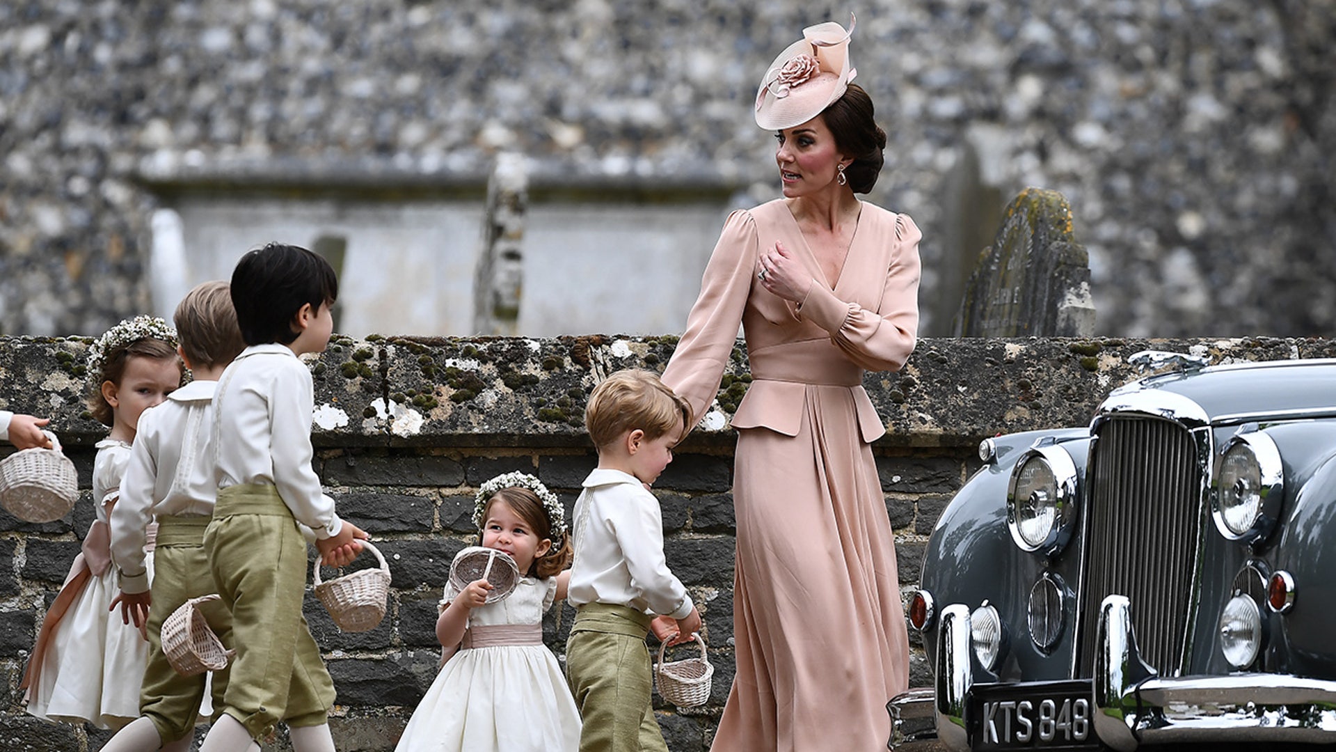 Princess Catherine ushers the kids outside the church