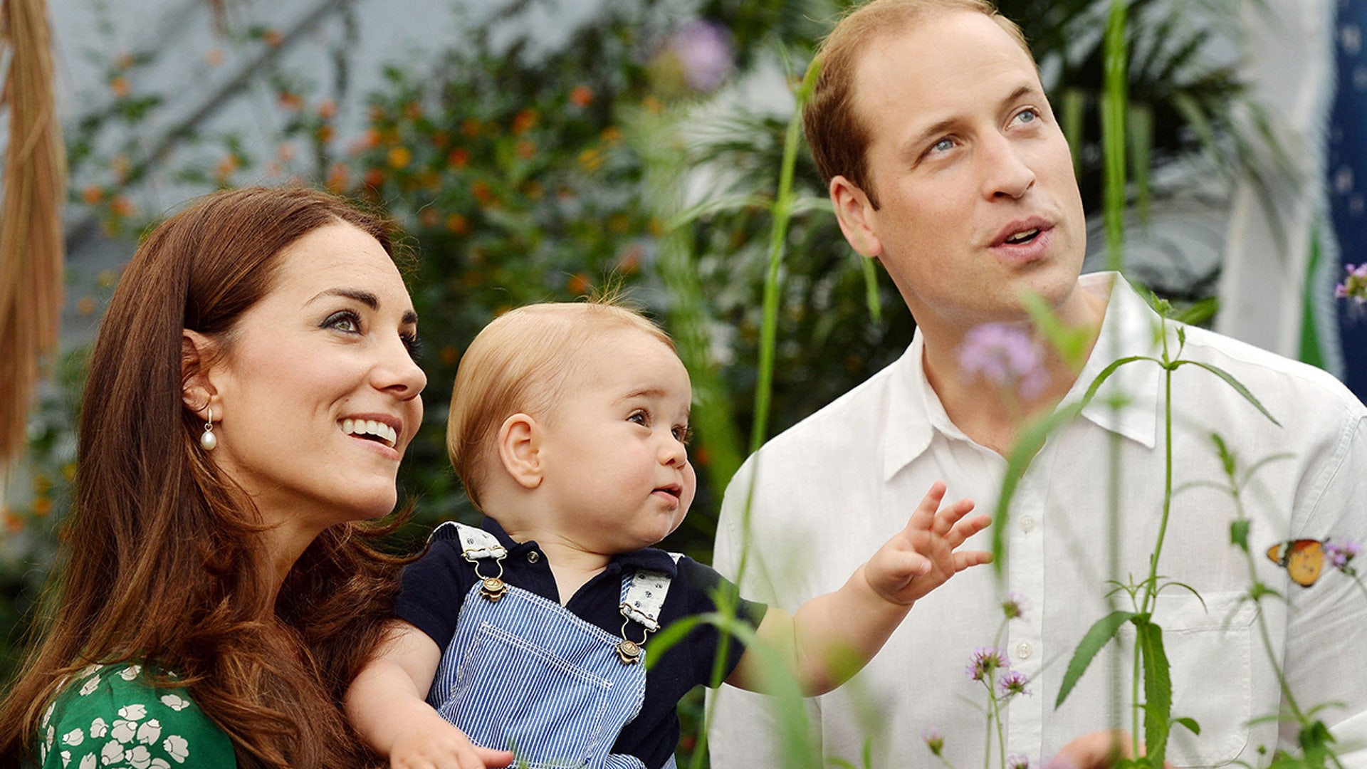 Princess Catherine, Prince William and son, George in a garden