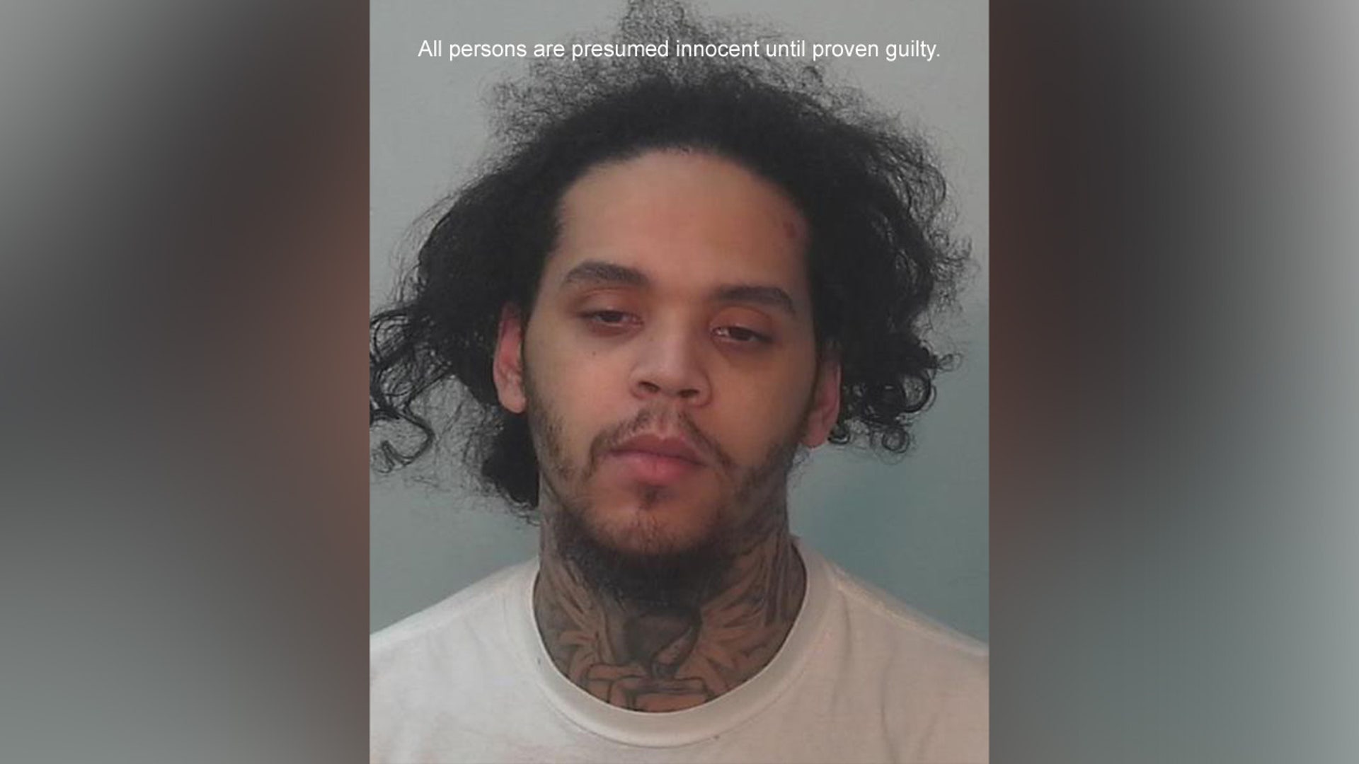 A mugshot of Andrew Gibson