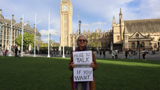 Retired British woman on trial for holding sign offering to talk to women considering abortion