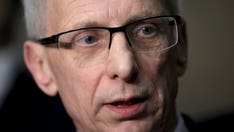 Bulgarian lawmakers approve prime minister's resignation as part of power-sharing agreement