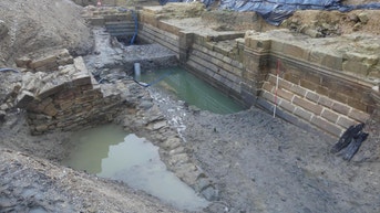640-year-old medieval castle with moat discovered under hotel courtyard