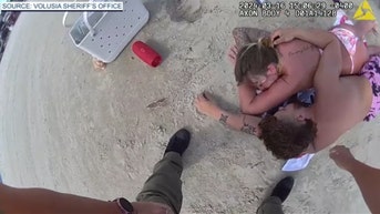 Couple arrested after being found passed out on beach with children gone