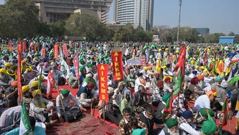 Protesting farmers flood India's capital demanding law to guarantee minimum crop prices