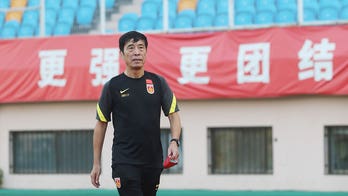 Ex-president of China's football association sentenced to life in prison for fixing matches
