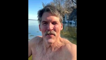 Shirtless GOP US Senate candidate takes cold plunge in Wisconsin lake, challenges Democratic opponent